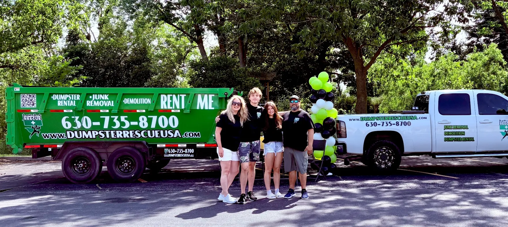 Dumpster Rescue LLC family crew in front of trucks - Chicagoland